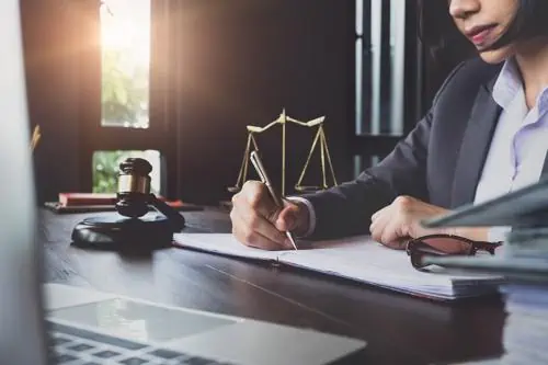 Rogers Distracted Driving Accident Lawyer An attorney filing a claim for a distracted driving accident.